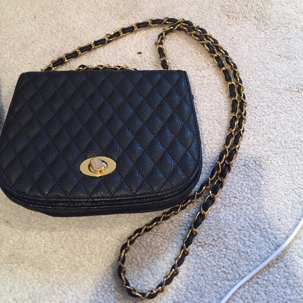 Gold chain black quilted cross body bag